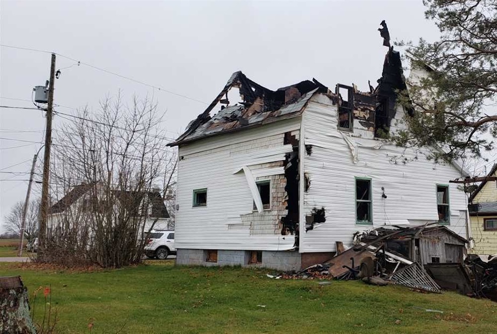 partially burned home in PEI