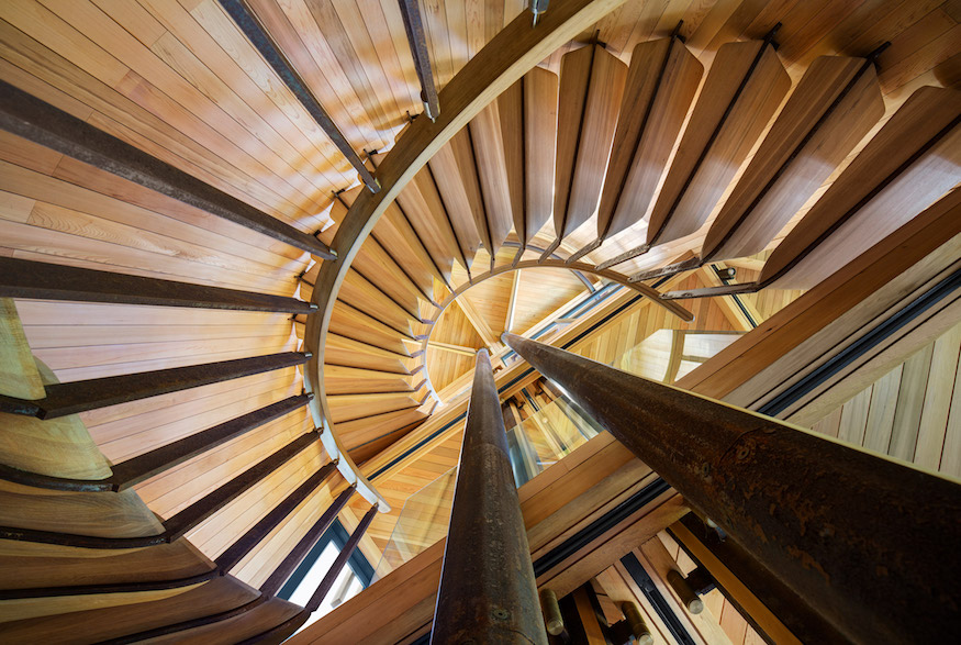 Cedar spiral staircase in luxury South African treehouse