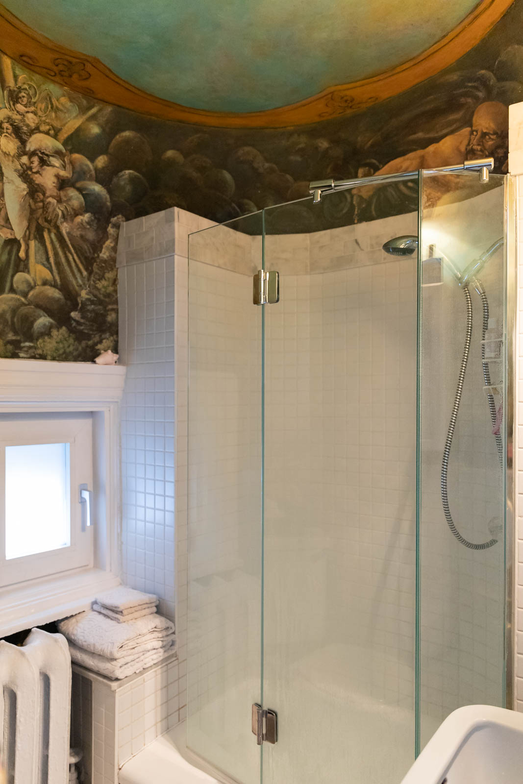A fresco painted above the shower