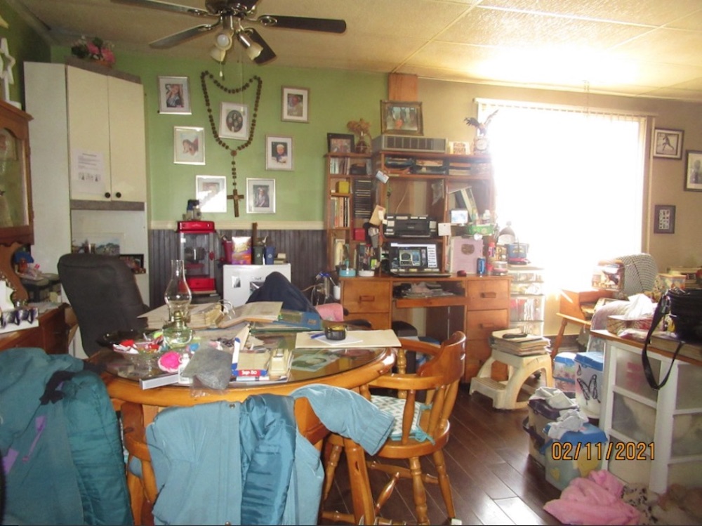 cluttered interior living room