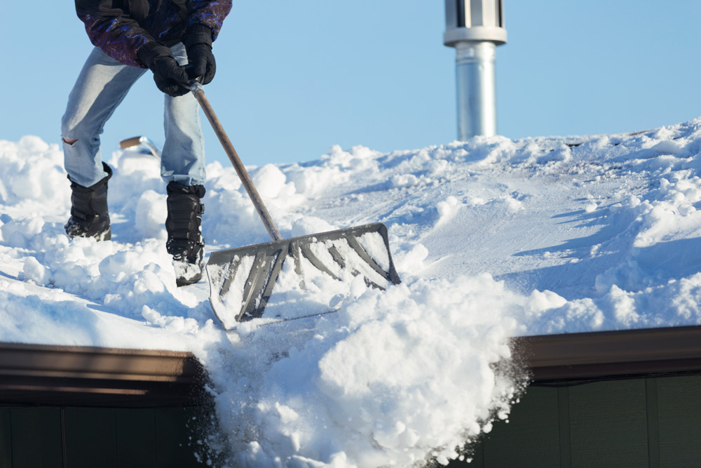 Clearing snow from a roof