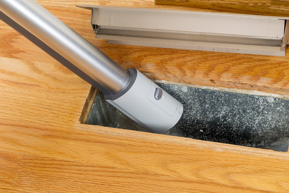 Cleaning air ducts in a home