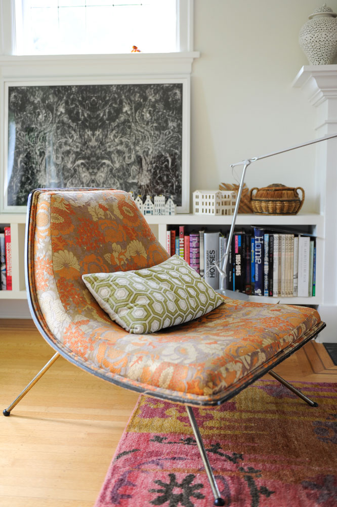 Living room mid-century mod chair with green patterned cushion