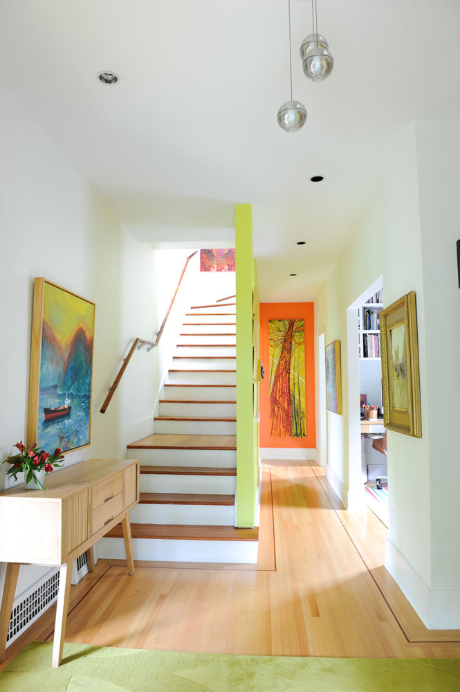 Staircase with lime-green post