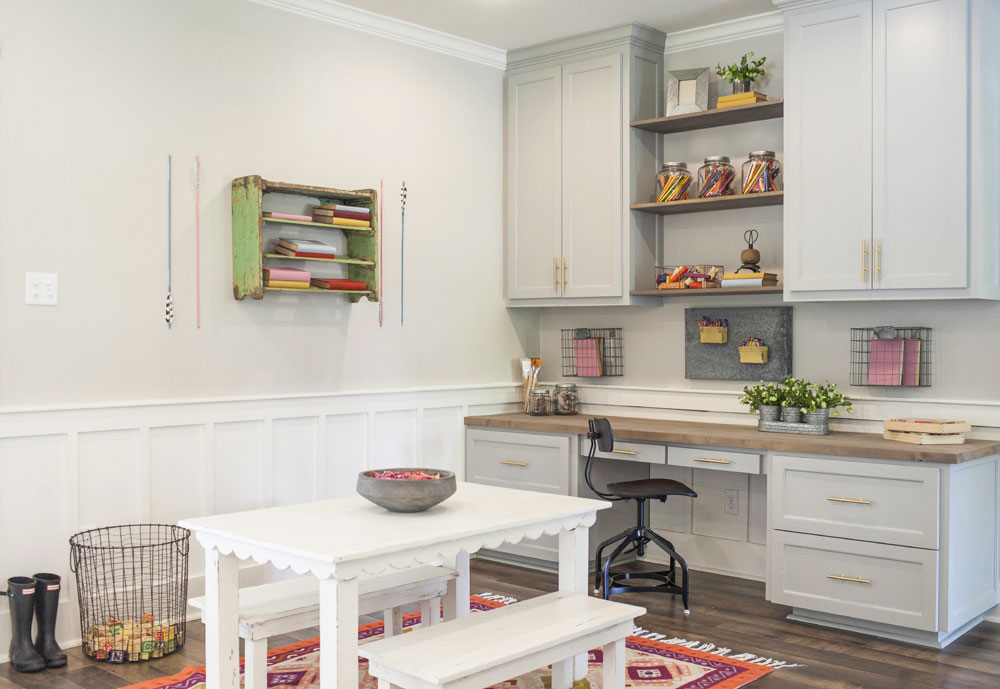 Stylish crafts room designed by Joanna Gaines with built-in storage.