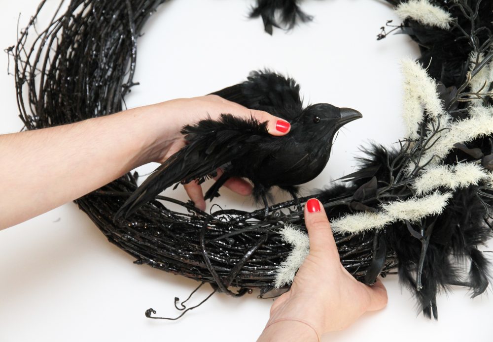 Black crow on black Halloween wreath