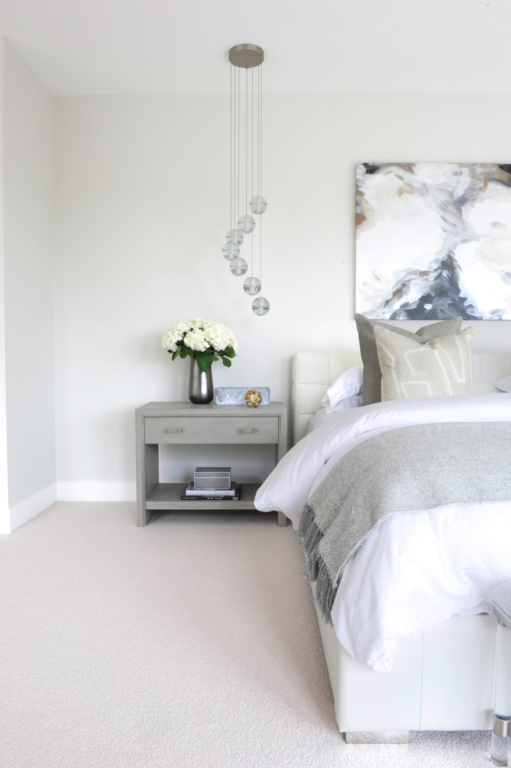 Modern bedroom with white carpet