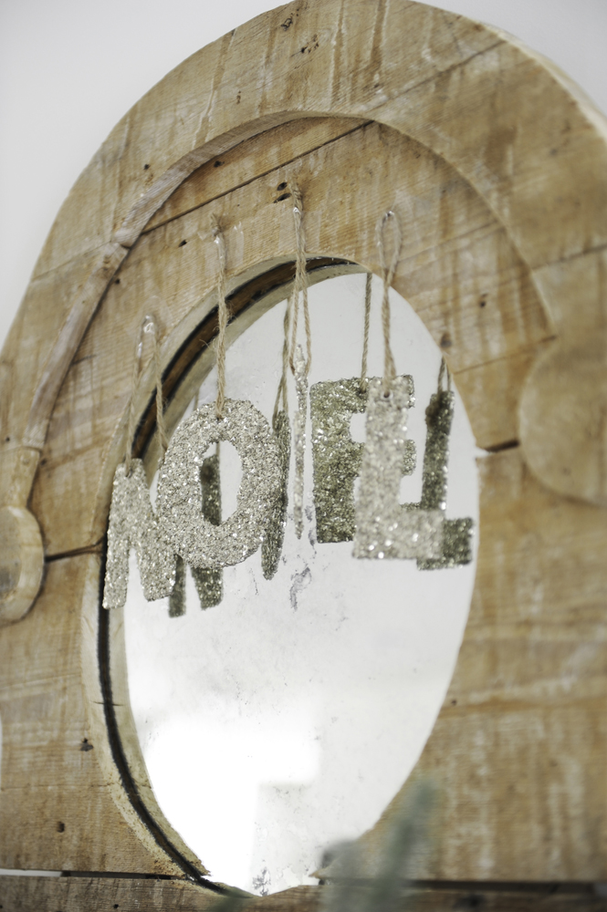 sparkly noel letters on wood framed mirror