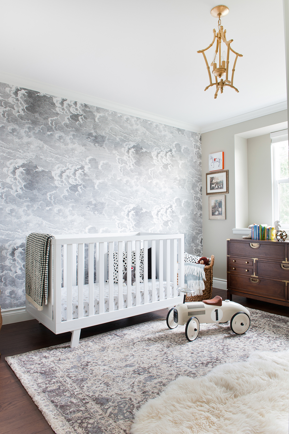 Kids' room with a cloud-inspired feature wall