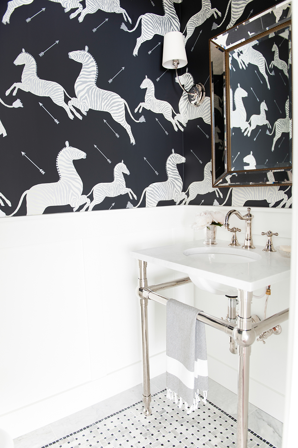 The powder room's knockout wallpaper has unexpected provenance