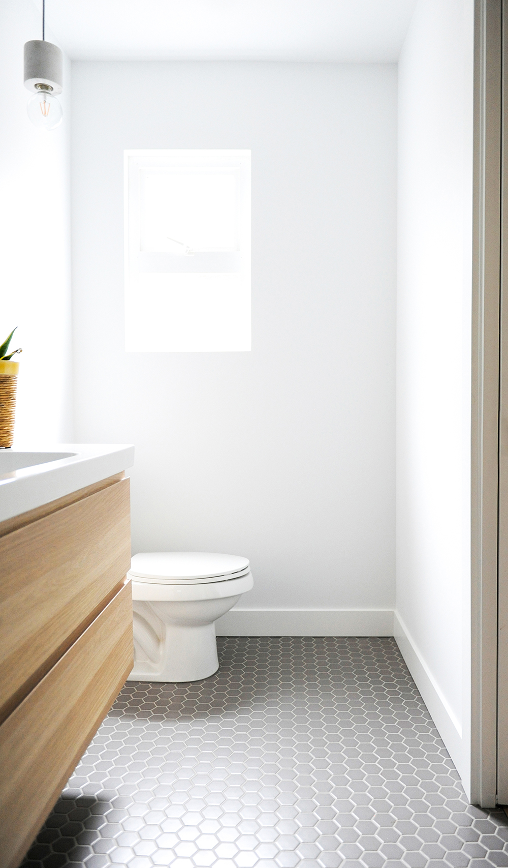 A tiny master ensuite with an expansive feel.