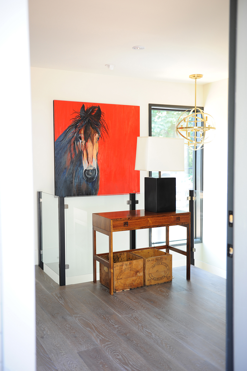 hall with red painting of horse head