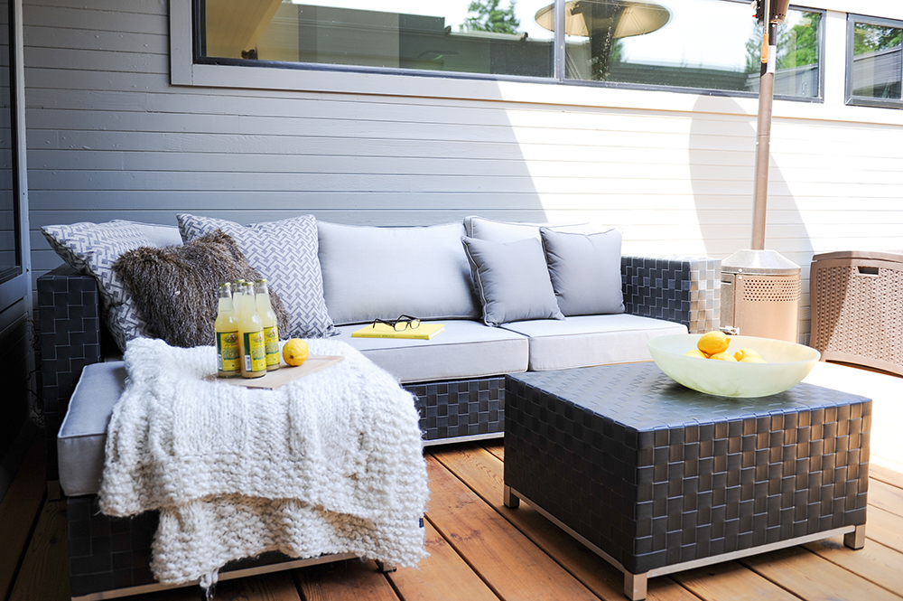 outdoor sofa and table with bowl of lemons
