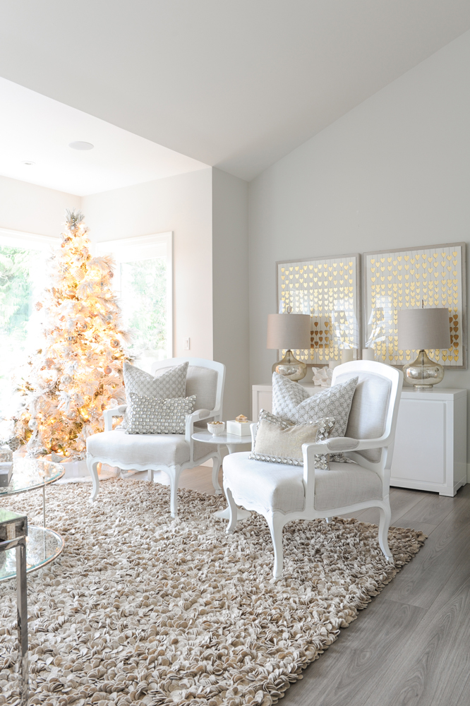 Two Bergere chairs, xmas tree in corner and gold heart artwork