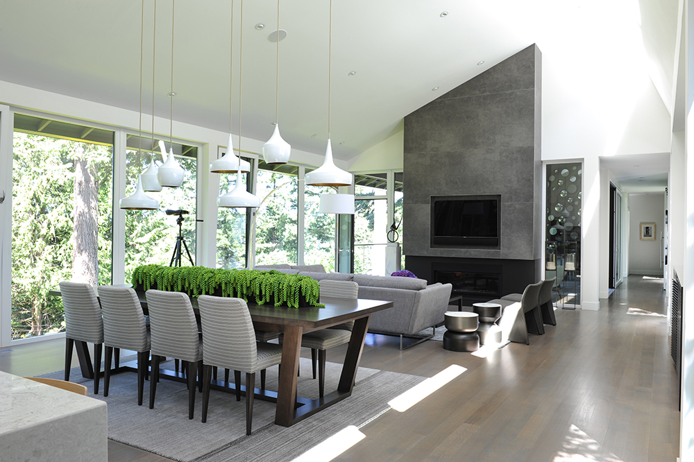 Nature-inspired dining area with sky-high ceilings.