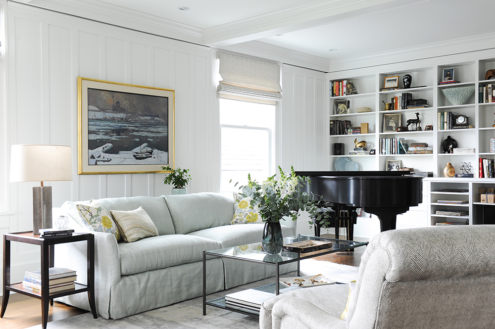 A light-filled living roomed decorated with antique finds.