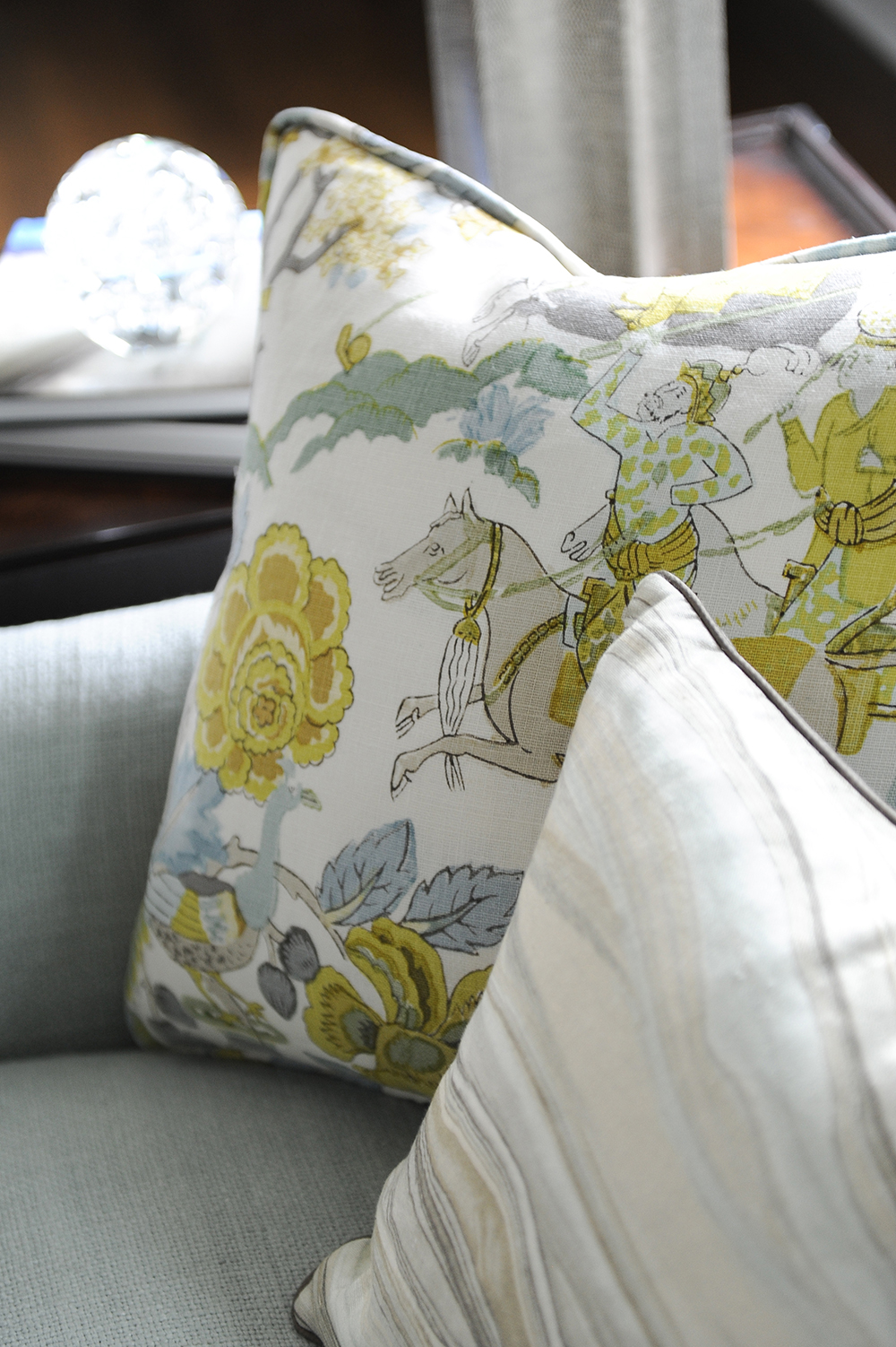 This pillow's bright fabric was the jumping-off point for the home's decor.