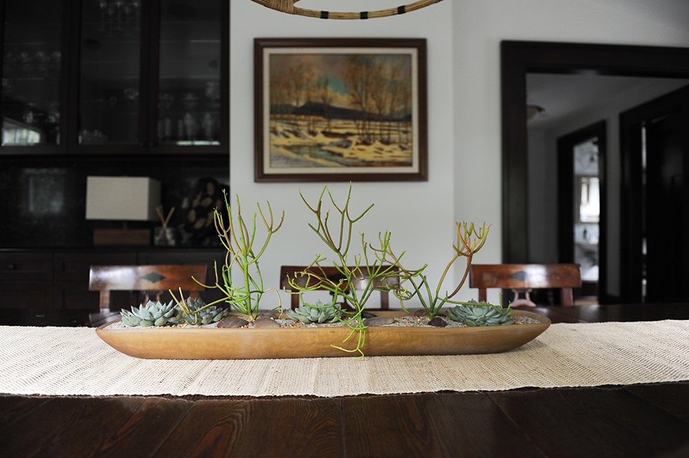 This succulent display makes for the perfect dining room centrepiece.