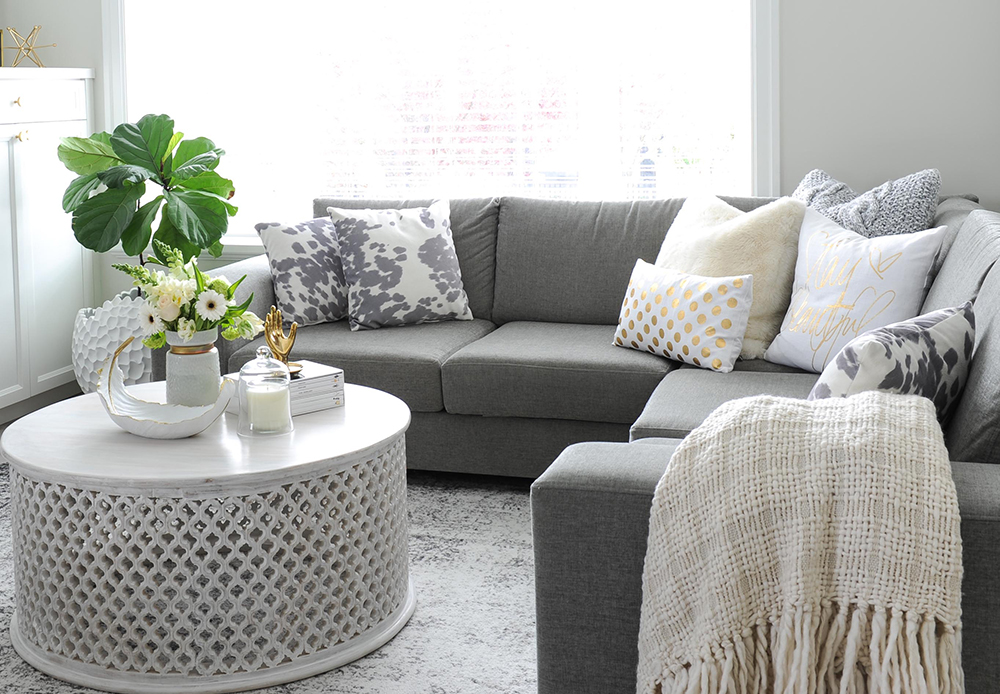 Living room featuring a mid-tone grey sectional.