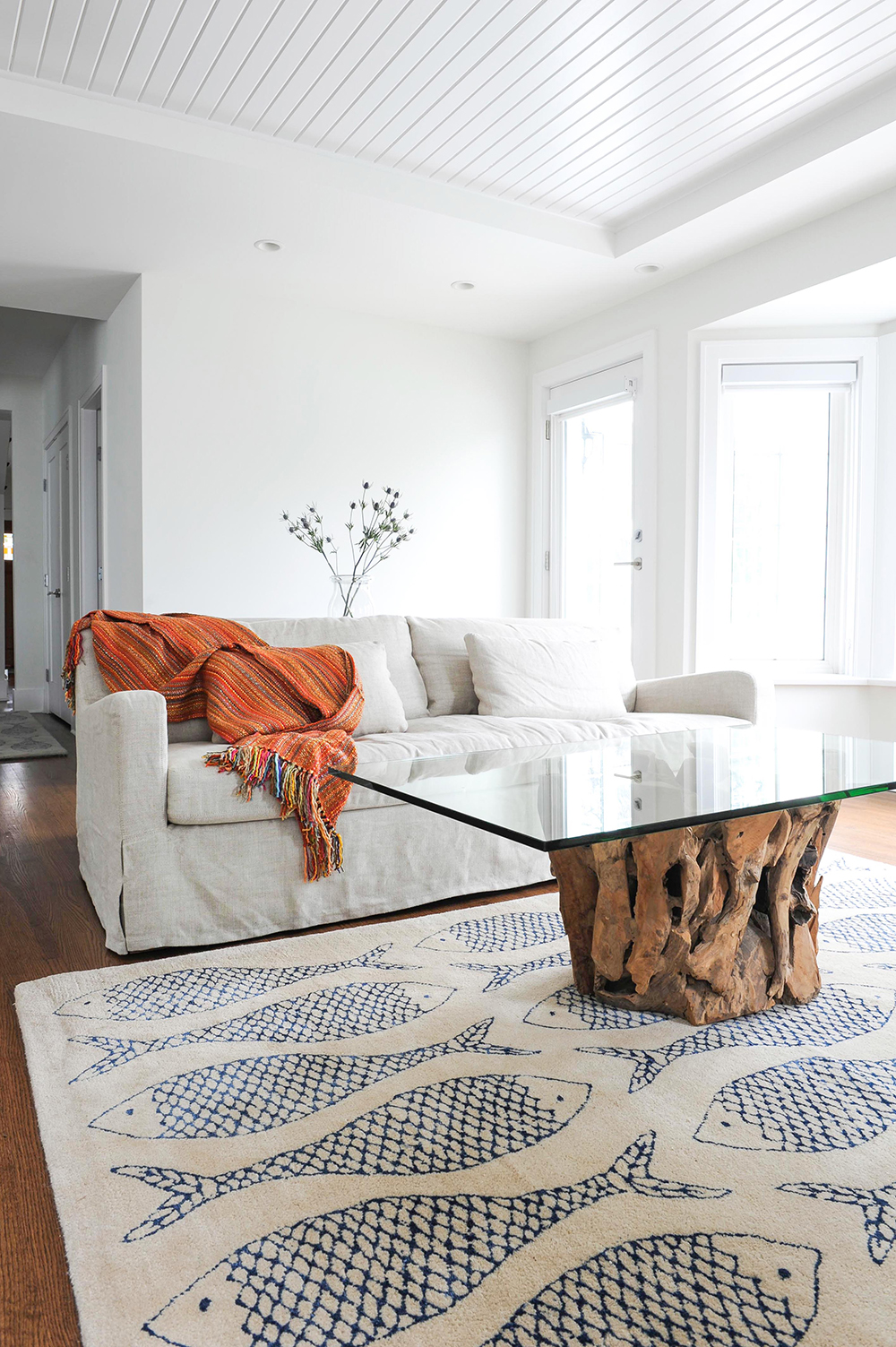 Stunning driftwood coffee table with a floating glass top