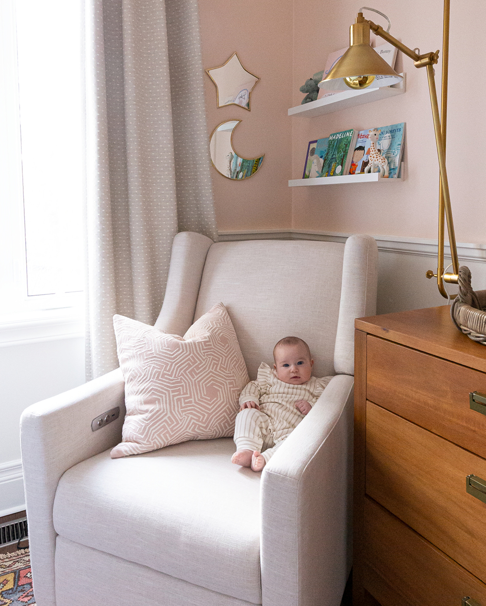 Decorette Kids Interiors small pink nursery, baby in linen glider chair