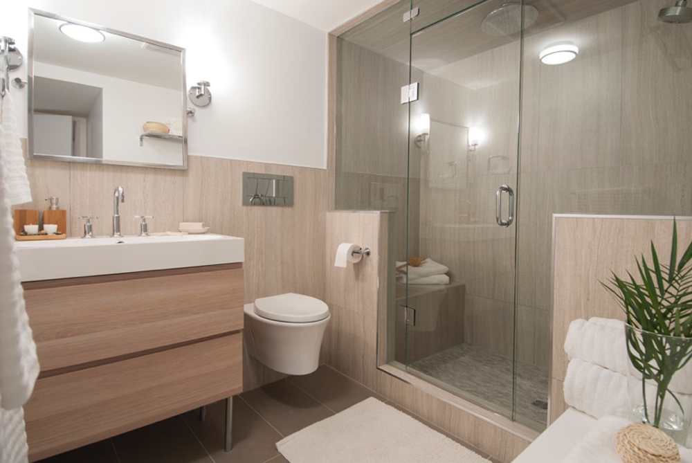 Light beige bathroom with shower, no tub