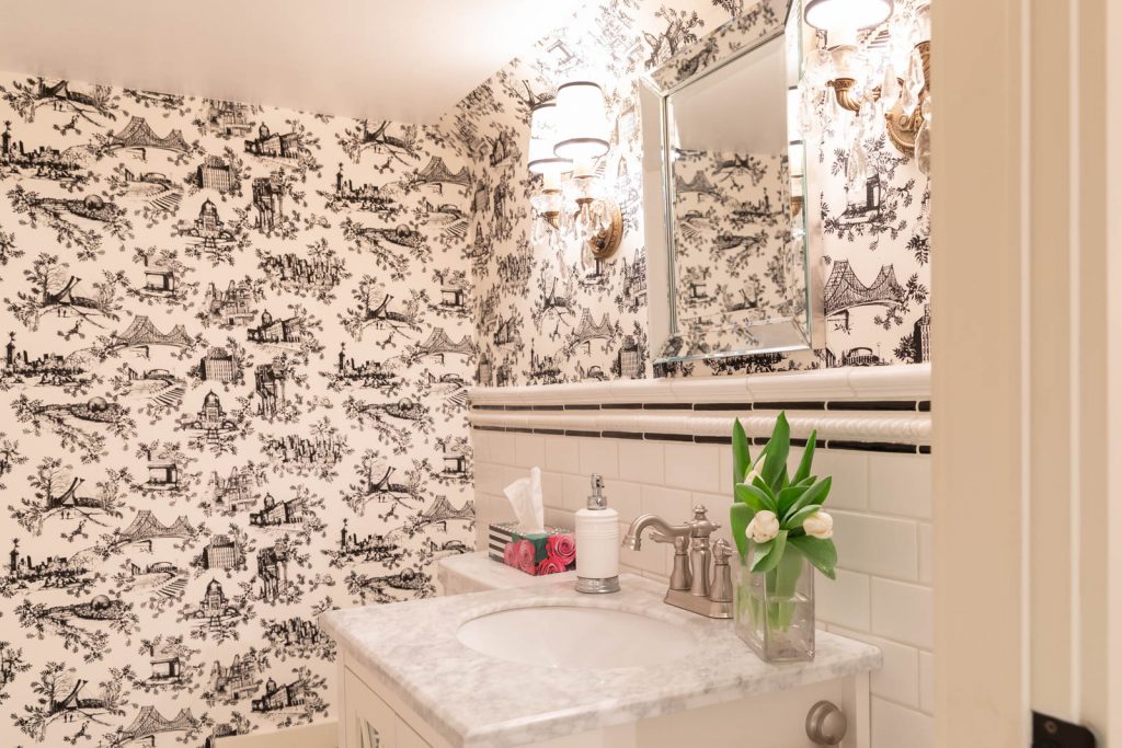 Bathroom with bold back-and-white wallpaper