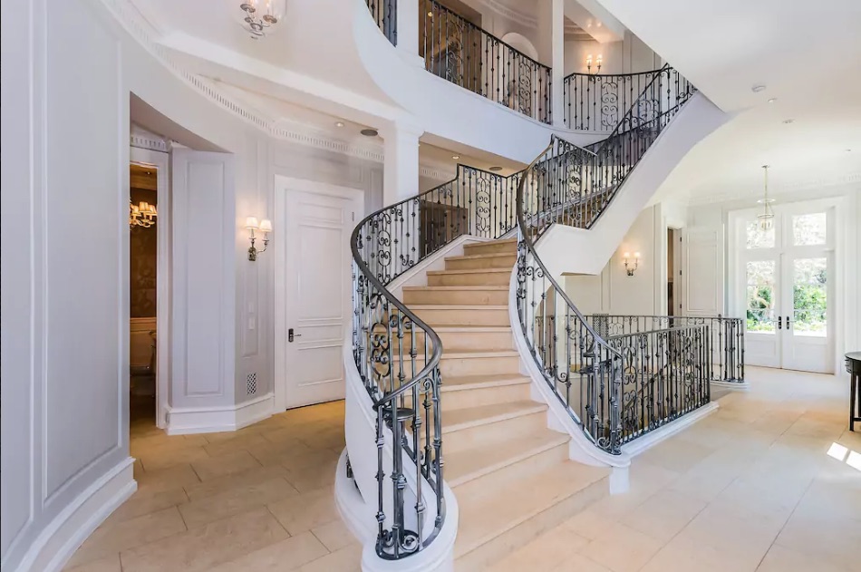 Foyer and staircase in Beverly Hills Airbnb rented by Drake