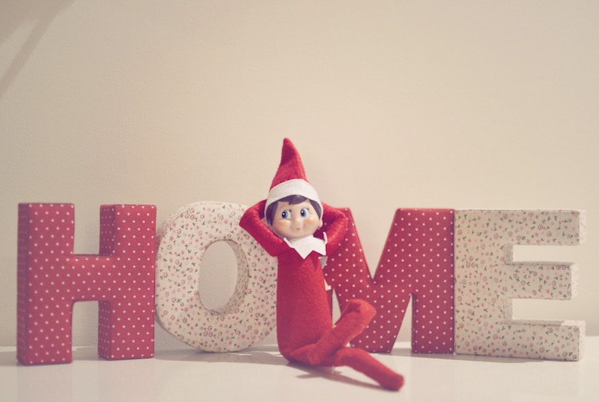 Elf on the Shelf sitting cross legged