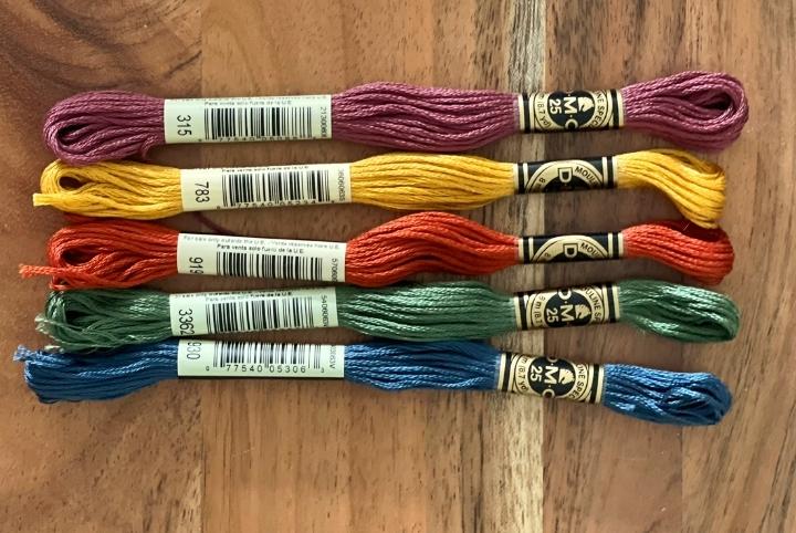 Five spools of string for hand embroidery