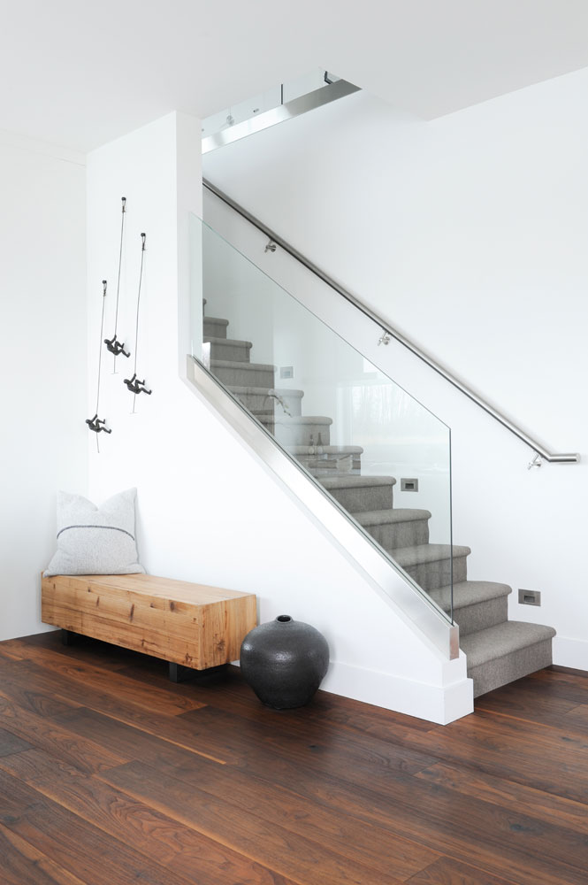 staircase with glass panels