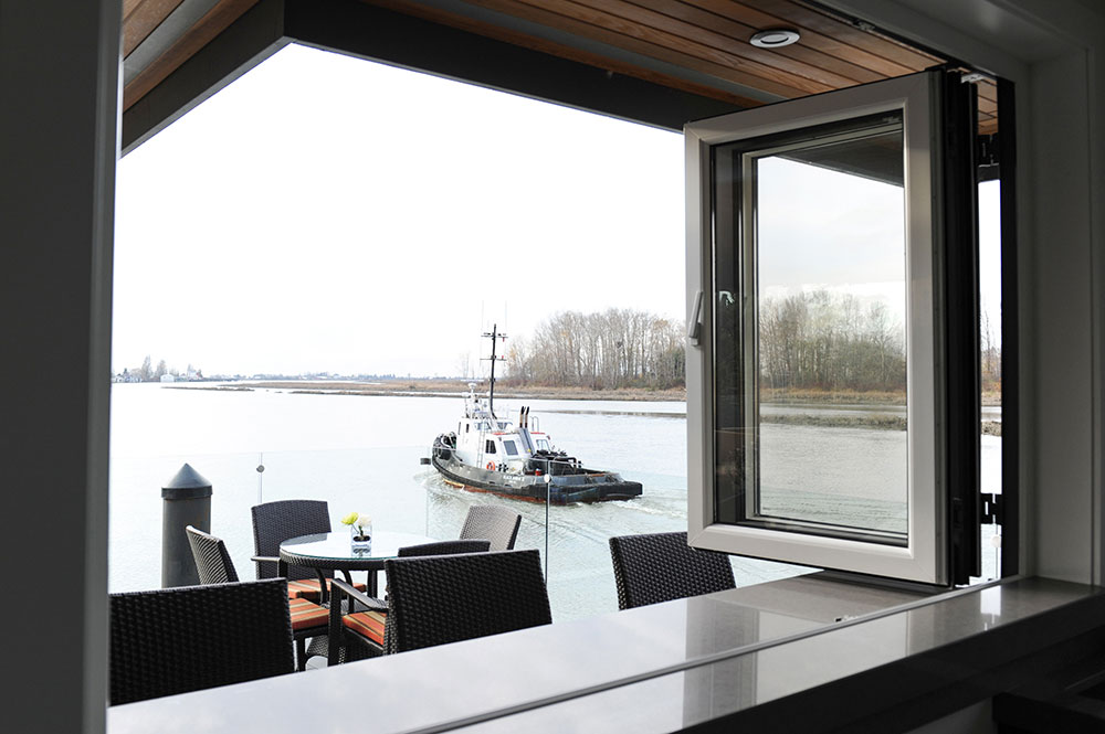 view to river and boat from inside bar