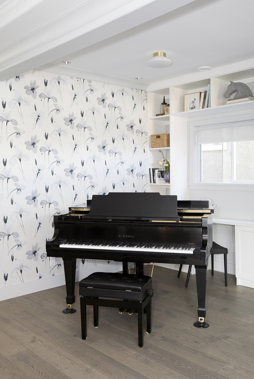 Music nook featuring floral wallpaper