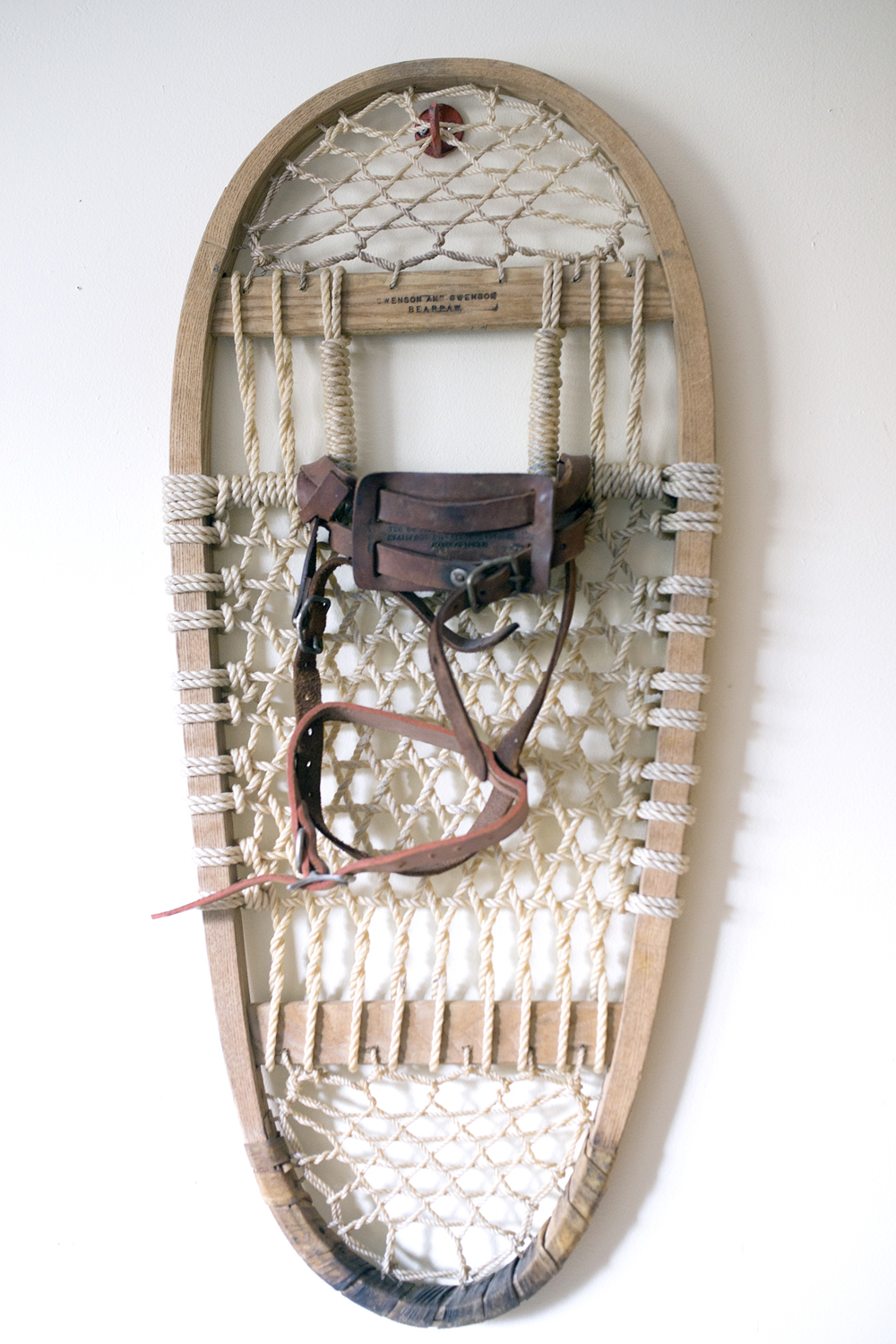 Snowshoe mounted on wall