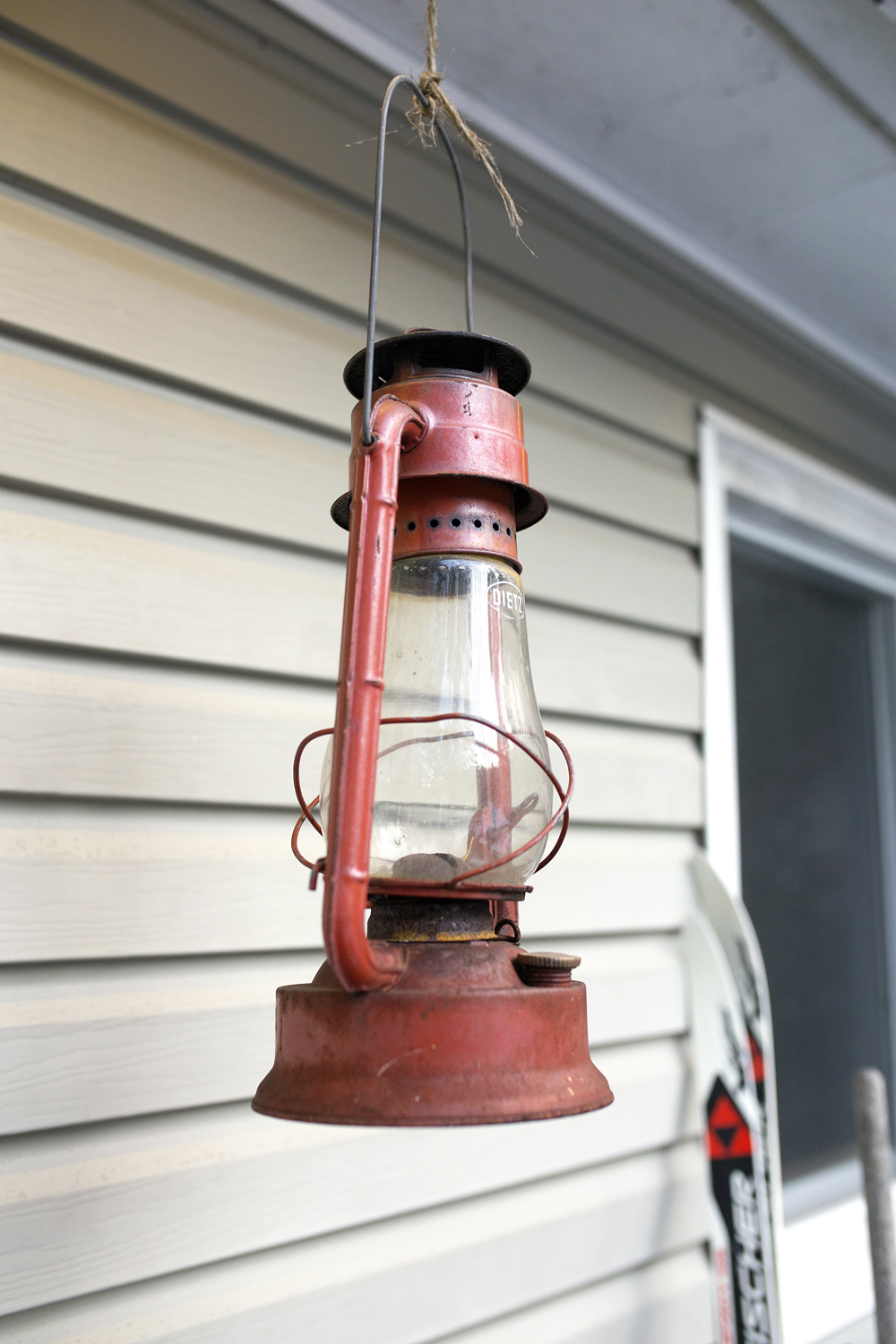 Oil lamp hanging outside home
