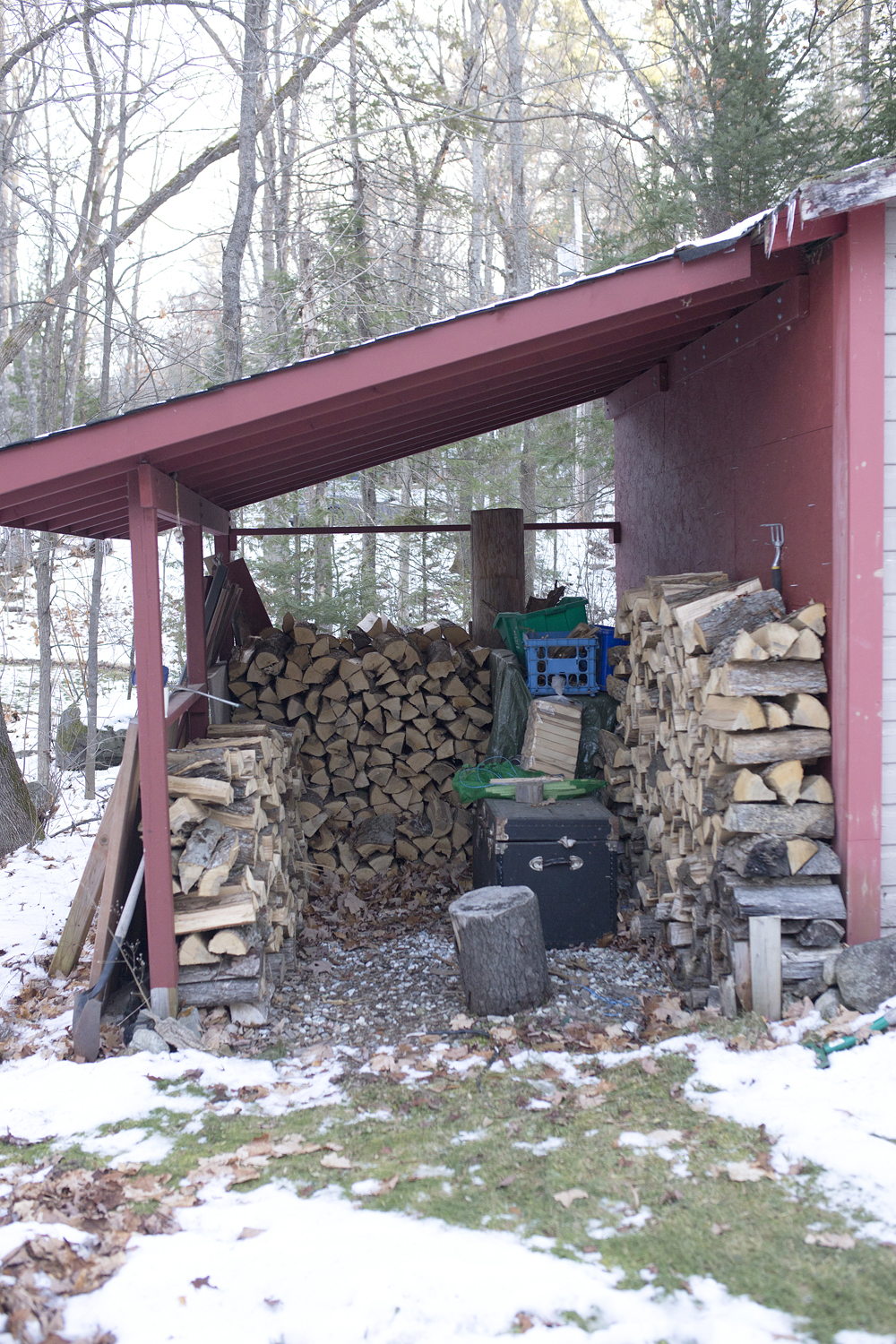 Wood pile in shed outside of home