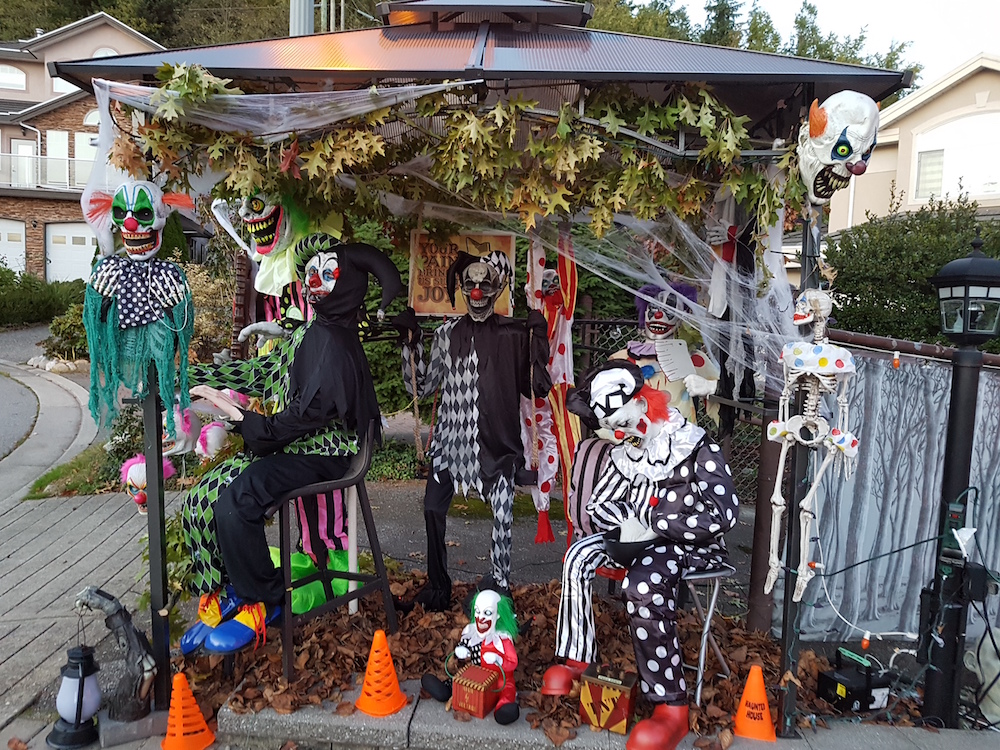 gazebo in driveway with spooky clowns