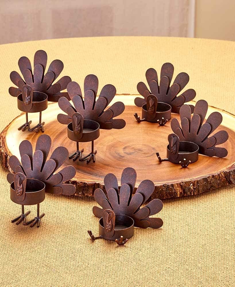 Turkey-shaped tea light holders for a Thanksgiving table