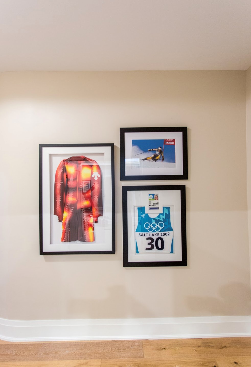 Three pieces of framed photography and memorabilia