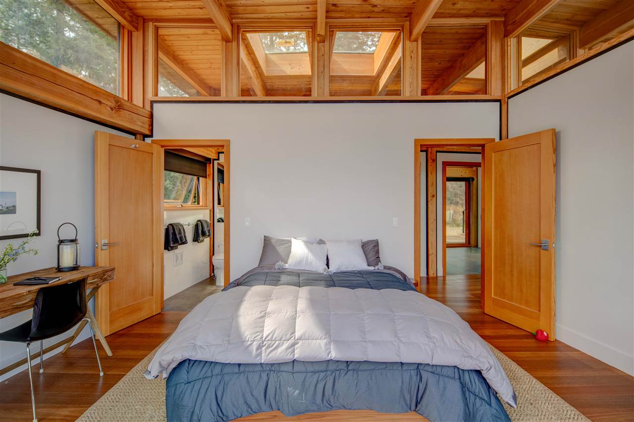 Bedroom with skylight and transom