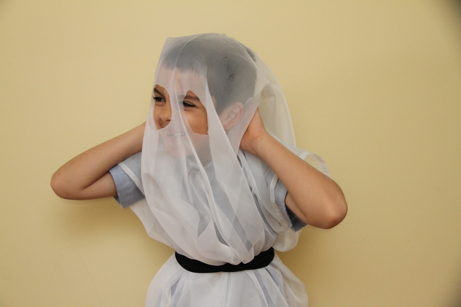 Child in DIY ghost costume