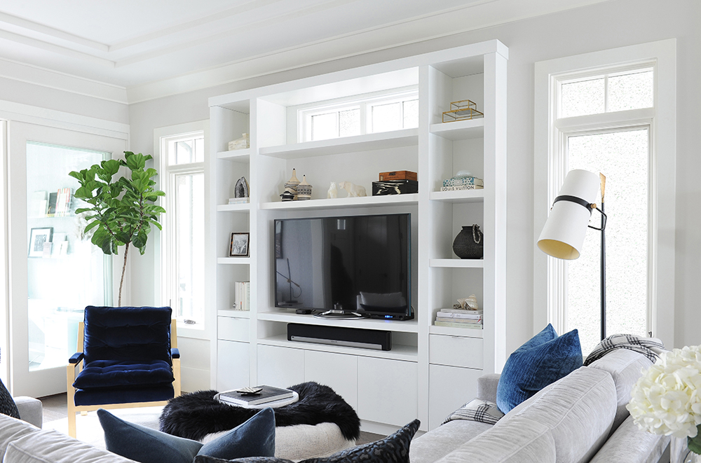 Timeless white living room design with glam accents.