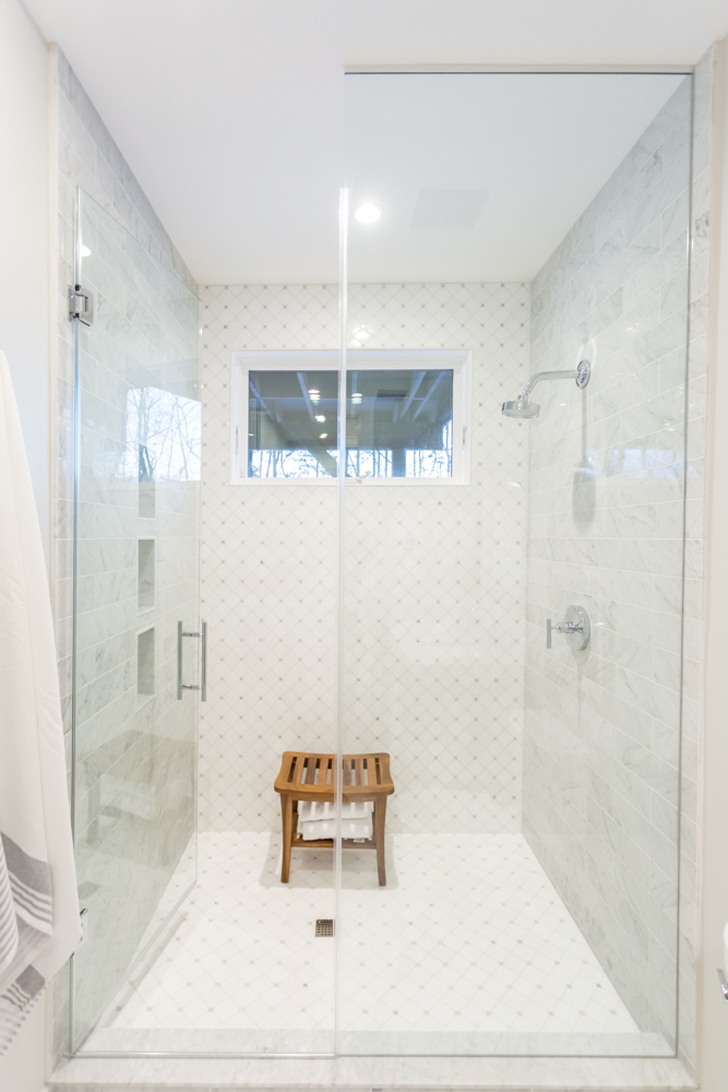 Modern Glass-Enclosed Shower with White Tiling