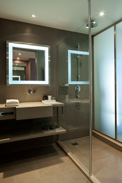 Bathroom with glass features