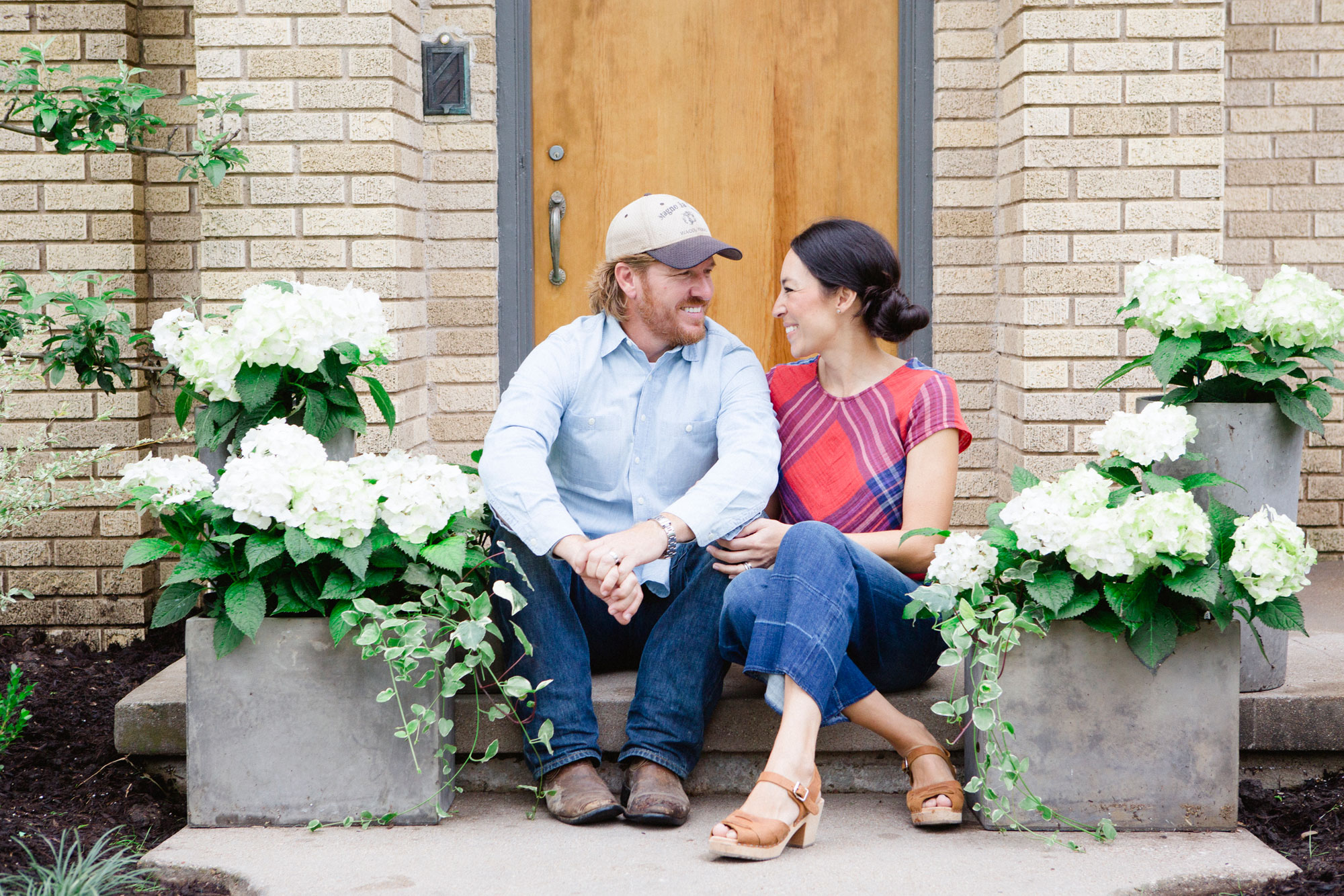 Chip and Joanna Gaines staring into each other's eyes with love.