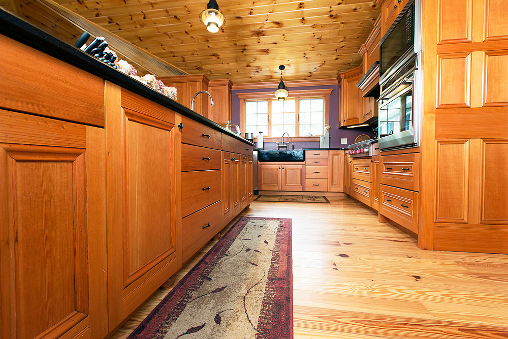 All wood cabinets featured in a rustic kitchen