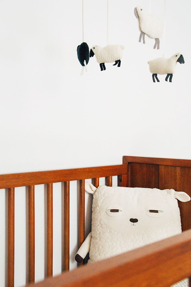 lamb stuffy in wood crib