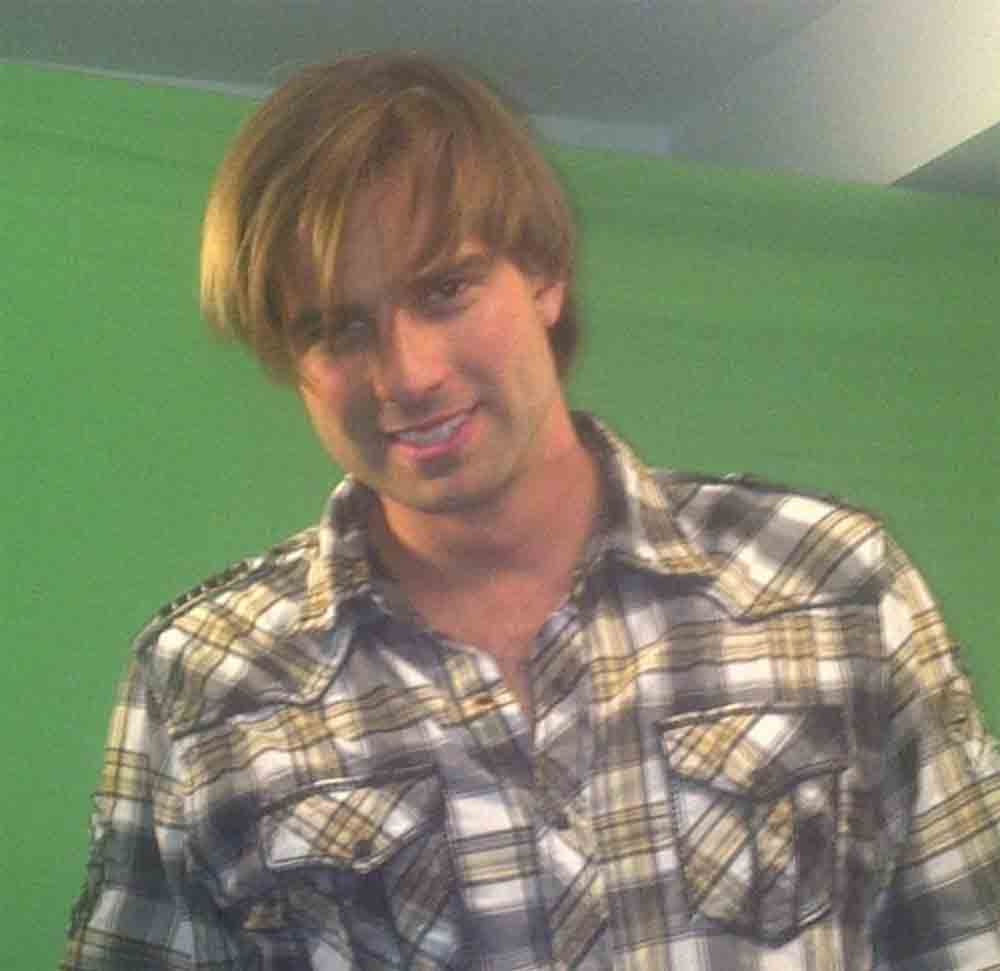 Scott McGillivray with long blow-dried bangs, reminiscent of Justin Bieber.