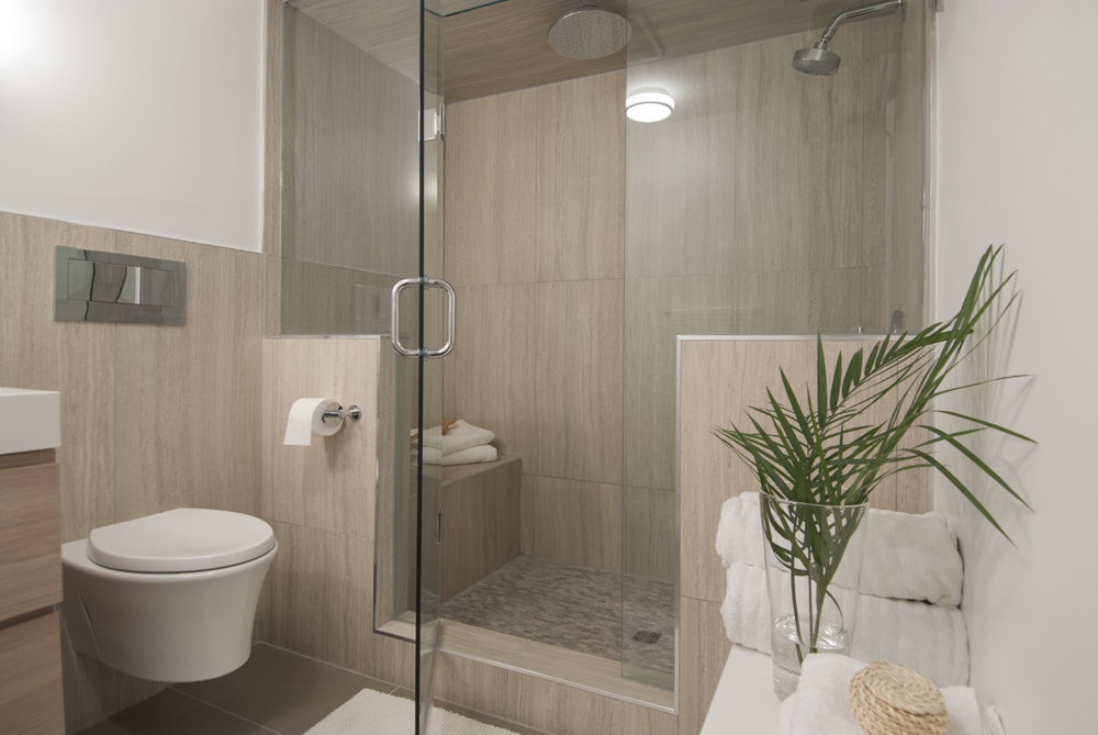 Beautiful big and neutral coloured bathroom en suite with large shower.