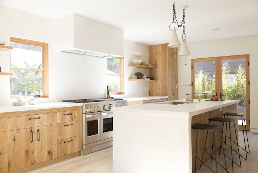 Cabinets and island in kitchen of Jon Hamm's Los Feliz home